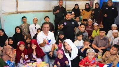 Ketua Perindo Kota Depok Anwar Nurdin dan Bacaleg Perindo Dapil 1 Panmas, Rere bersama para anak yatim.